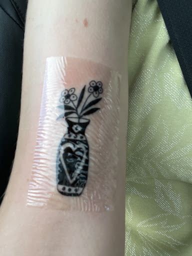 Explore feather memorial tattoo ideas, creative tattoo ideas in Fountain, available at United Tattoo