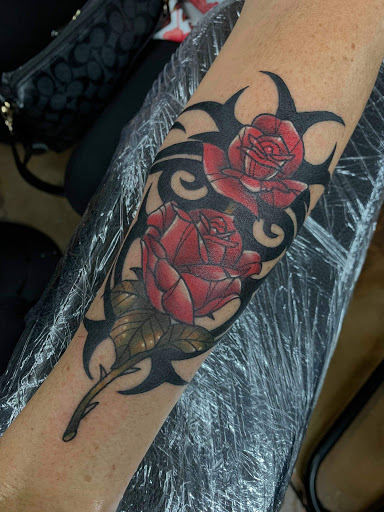 Explore hand tattoo ideas female, creative tattoo ideas in Eustis, available at Iron Will Tattoo