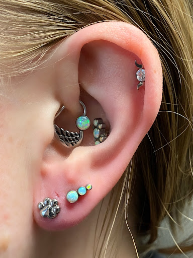 Explore pride tattoo ideas, creative tattoo ideas in Springfield, available at Body Piercing By Qui Qui