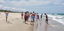 Foto von Grande do Ervino mit langer gerader strand