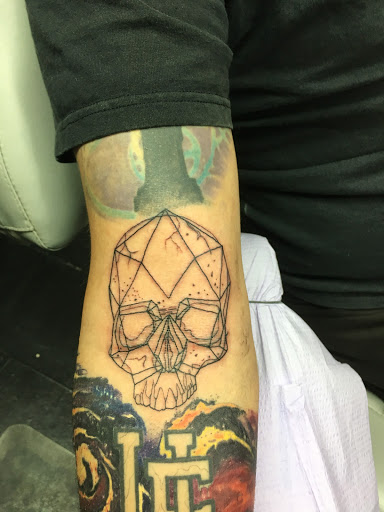 Find paradox tattoo ideas for your next unique tattoo in Largo at Alchemy Tattoos and Body Piercings