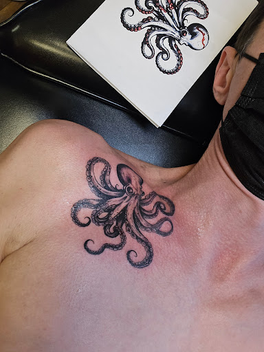Explore gambling tattoos ideas, creative tattoo ideas in Davenport, available at Revival Tattoo and Piercing