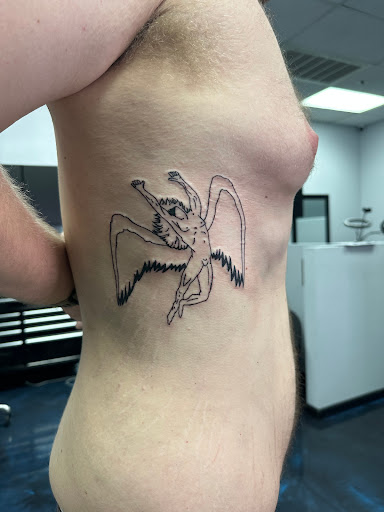 Explore basketball tattoo ideas for guys, creative tattoo ideas in Glendale, available at Black Raven Tattoo