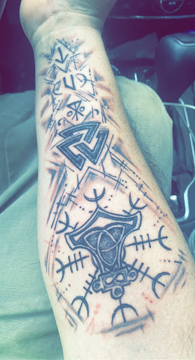 Explore rose tattoo cover up ideas, creative tattoo ideas in Waverly, available at Hellbilly Tattoos & Oddities