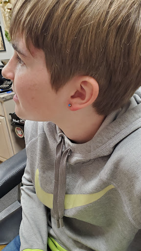 Explore singer tattoo ideas, creative tattoo ideas in Omaha, available at Ironwood Ink