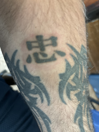 Explore symbol tattoo ideas, creative tattoo ideas in Towson, available at Removery Tattoo Removal & Fading