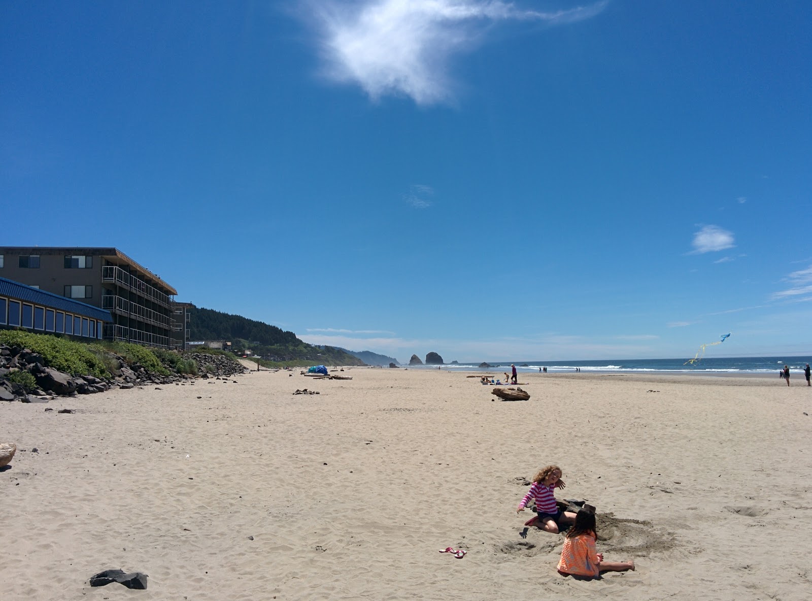 Photo of Cannon Beach with long straight shore