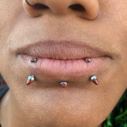 Explore cover up tattoo ideas male, creative tattoo ideas in Aurora, available at Bespoke Piercing & Jewelry (Inside Bonaroo Tattoo)