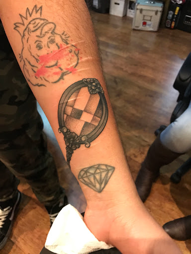 Explore black ink tattoo ideas, creative tattoo ideas in York, available at Marked 4 Life Tattoos