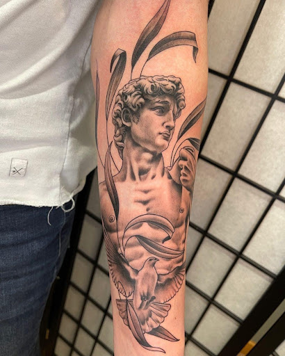 Explore elephant tattoo ideas for men, creative tattoo ideas in Kenosha, available at Kenosha Tattoo Company