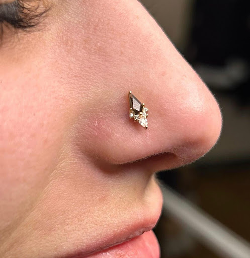 Explore knee scar tattoo ideas, creative tattoo ideas in Salt Lake City, available at Glimpse Piercing Boutique