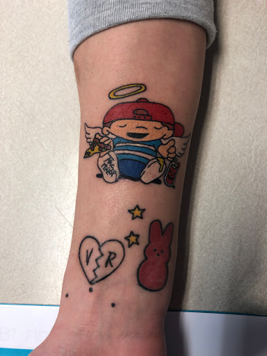 Explore new school tattoo ideas, creative tattoo ideas in Alamosa, available at The Shop Tattoo & Comics