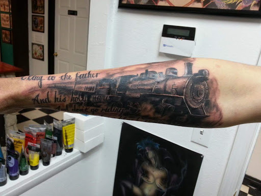 Explore cheetah tattoo ideas, creative tattoo ideas in Powell, available at Against All Odds Tattoos and Piercings