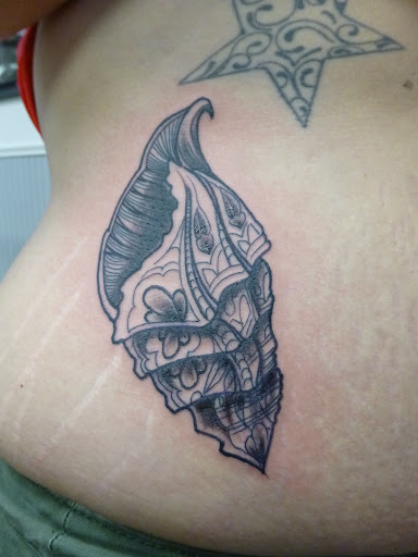 Tattoo Shop «magnum opus tattoo company», reviews and photos, 1817 Padre Blvd #4, South Padre Island, TX 78597, USA