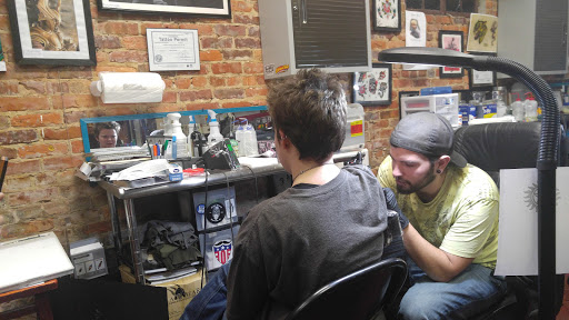 Tattoo Shop «Family First Tattoo», reviews and photos, 315 Castle St, Wilmington, NC 28401, USA