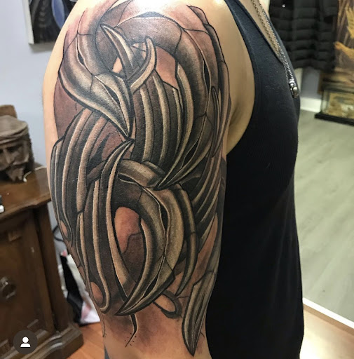 Explore tattoo sleeve ideas lion, creative tattoo ideas in Girard, available at Empress Tattoos FKA Treehouse Tattoo