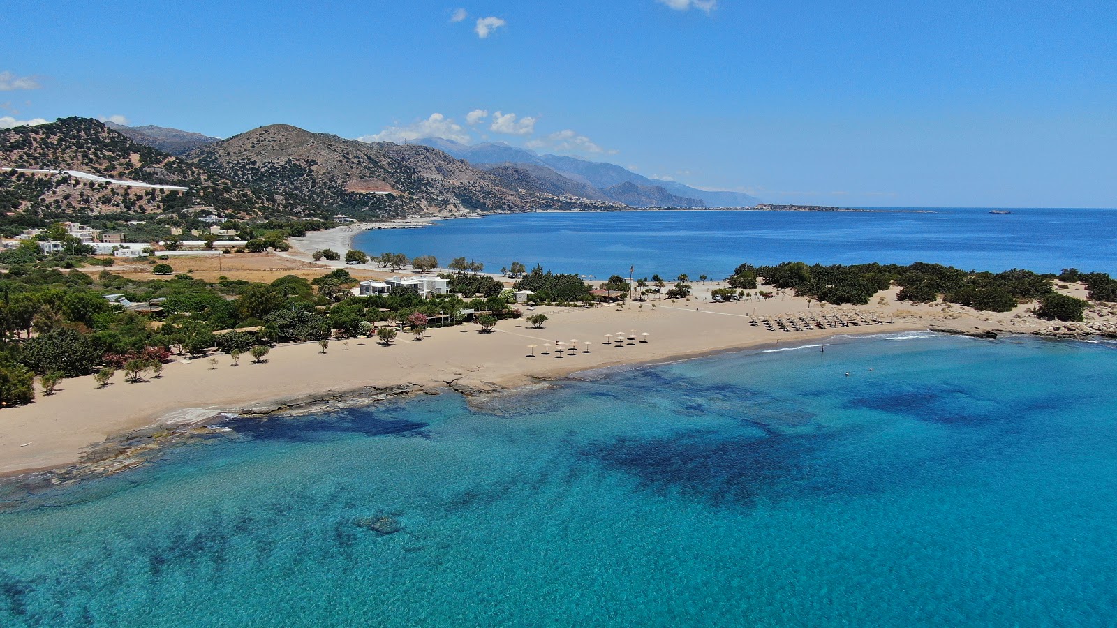 Photo of Grammeno Beach backed by cliffs