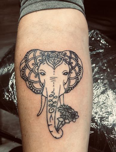 Explore tattoo ideas for arm, creative tattoo ideas in North Tonawanda, available at Dark Side Ink Tattoo Studio