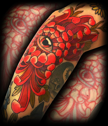 Explore back arm tattoo ideas for guys, creative tattoo ideas in Jacksonville Beach, available at Black Label Tattoo & Piercing