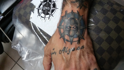 Tattoo Shop «Almighty Tattoo ( Under new ownership now Loyalty Tattoo Company!!!!)», reviews and photos, 5337 S Dort Hwy, Flint, MI 48507, USA