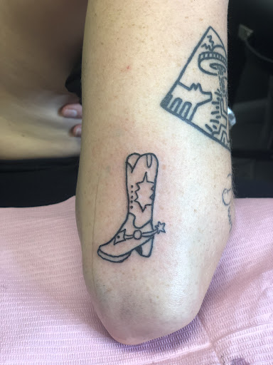 Explore black king tattoo ideas, creative tattoo ideas in Harrisonburg, available at Liberty Street Tattoos