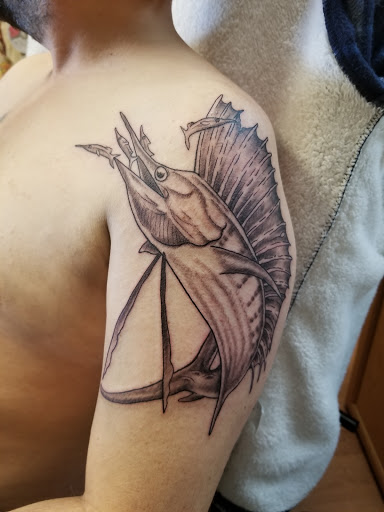 Explore tattoo ideas for leg sleeve, creative tattoo ideas in Monroe, available at Timeless Ink Tattoo Gallery