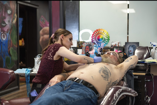 Explore falcon tattoo ideas, creative tattoo ideas in Clarksville, available at Dark Raine Tattoo