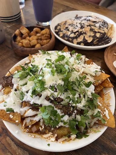 Birria chilaquiles, front, were wonderful with a huge portion and done perfectly 