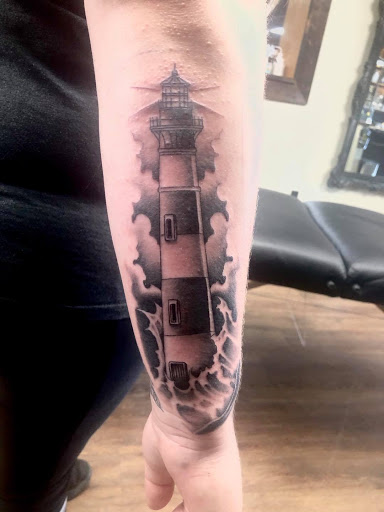 Explore domestic violence tattoo ideas, creative tattoo ideas in Canton, available at Couture Tattoo and Body Piercing