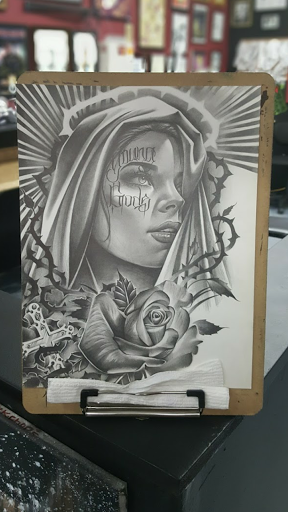 Find red indian tattoo ideas for your next unique tattoo in Stockton at THE PIRATES LOUNGE TATTOO PARLOR