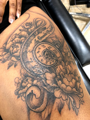 Explore cover up tattoo ideas for ankle, creative tattoo ideas in Columbus, available at Atlas Tattoo and Piercing Studio