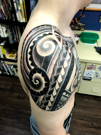 Explore superhero tattoo ideas, creative tattoo ideas in New Kensington, available at BLUE HERMIT TATTOO