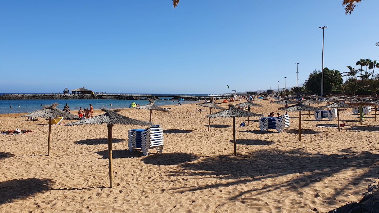 Playa de la Guirra'in fotoğrafı düz ve uzun ile birlikte
