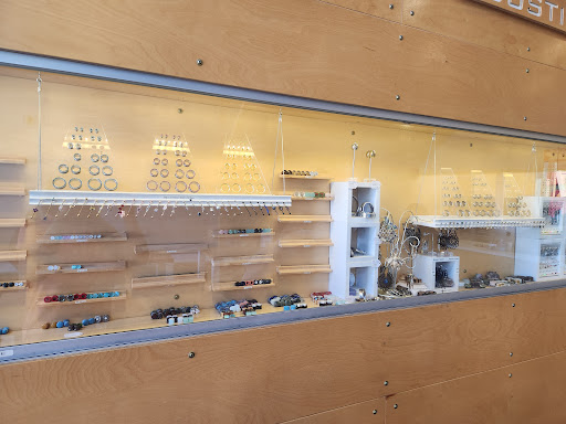 Explore cover up flower tattoo ideas, creative tattoo ideas in Omaha, available at Big Brain