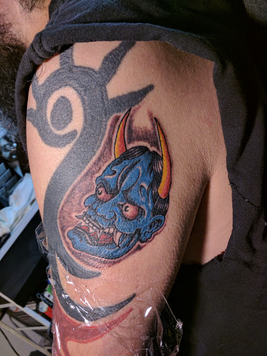 Explore dark side of the moon tattoo ideas, creative tattoo ideas in Victorville, available at Doctor Inks Tattoo Clinic