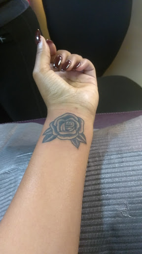 Explore mother son and daughter tattoo ideas, creative tattoo ideas in Greensboro, available at Seven Sagas Tattoo Studio