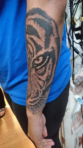 Explore neck tattoo ideas male, creative tattoo ideas in Jonesboro, available at Immortal Ink