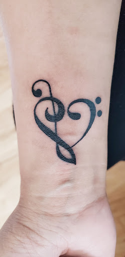 Explore ghostface tattoo ideas, creative tattoo ideas in Wilmington, available at Lost Harbor Tattoo