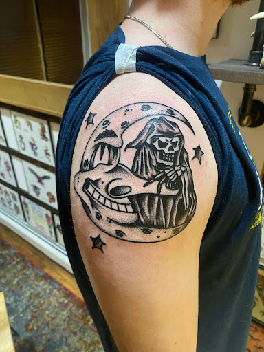 Explore leg tribal tattoo ideas, creative tattoo ideas in Glenside, available at Yellow Rose Tattoo