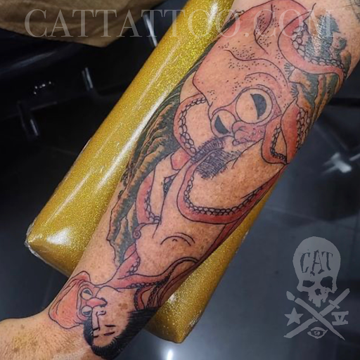 Explore forehead tattoo ideas, creative tattoo ideas in Addison, available at Cat Tattoo