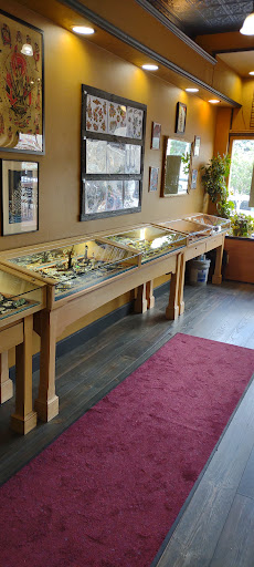 Explore butterfly vine tattoo ideas, creative tattoo ideas in Lake George, available at Lake George Tattoo Company