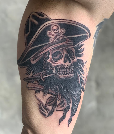 Explore dinosaur tattoo ideas for son, creative tattoo ideas in Brooklyn, available at Hand of Glory Tattoo & Piercing