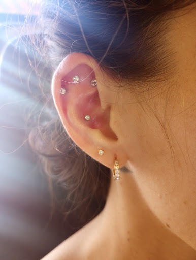 Explore women back tattoo ideas, creative tattoo ideas in Ottumwa, available at Be You Body Piercing & Jewelry