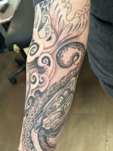 Explore tattoo sleeve ideas lion, creative tattoo ideas in Papillion, available at Moon Water Tattoo