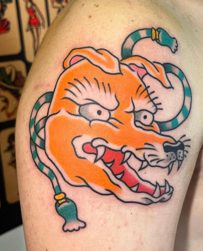 Explore mens spine tattoo ideas, creative tattoo ideas in Ludlow, available at The Fat Cat Tattoo