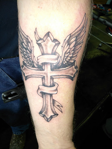 Explore rip tattoo ideas for females, creative tattoo ideas in Spokane, available at UndeadINK