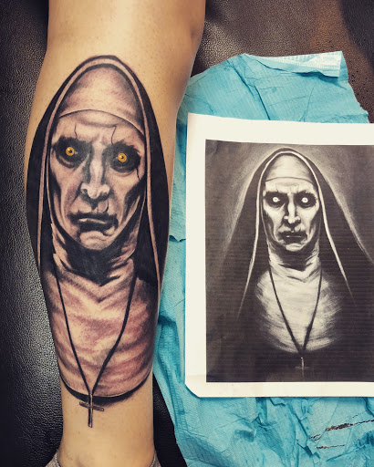 Explore christian sleeve tattoo ideas, creative tattoo ideas in Alamogordo, available at The Poison Frog Tattoo Studio