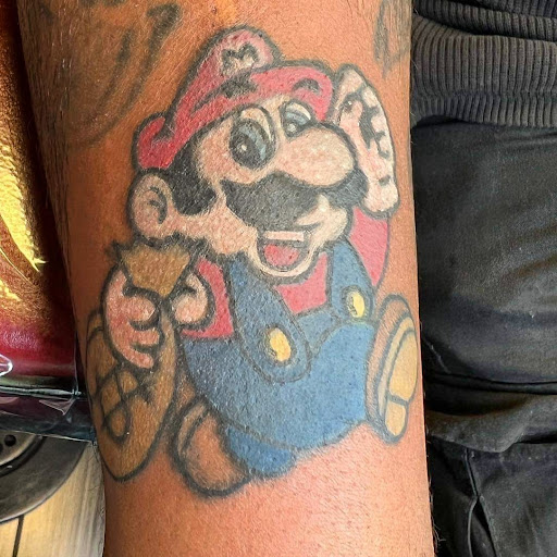 Explore half sleeve tribal tattoo ideas, creative tattoo ideas in Chicago, available at Mind Crusher Tattoo