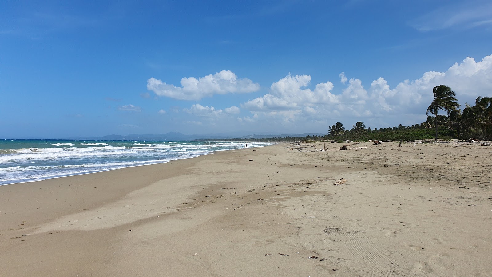 Foto van Playa Boca de Yasica met helder zand oppervlakte