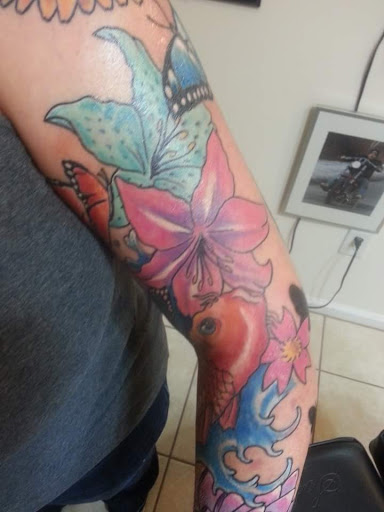 Explore smiley face tattoo ideas, creative tattoo ideas in Brunswick, available at Street Life Tattoos